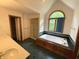 Primary bathroom featuring a soaking tub, separate shower, and double sinks at 12307 Pebblepointe Pass, Carmel, IN 46033