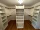 Spacious walk-in closet with built-in shelving, offering ample storage at 12307 Pebblepointe Pass, Carmel, IN 46033