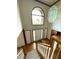 Bright foyer with hardwood floors, pendant lighting, and large arched window at 12307 Pebblepointe Pass, Carmel, IN 46033