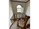 Entryway with wood floors, high ceilings, and chandelier is bright and welcoming at 12307 Pebblepointe Pass, Carmel, IN 46033