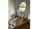 Bright, open foyer with hardwood floors, staircase, and large arched window at 12307 Pebblepointe Pass, Carmel, IN 46033