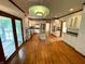 Modern kitchen boasts granite countertops, stainless steel appliances, and a large island at 12307 Pebblepointe Pass, Carmel, IN 46033