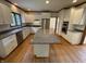 Beautiful updated kitchen features a large island, stainless appliances, and lots of counter space at 12307 Pebblepointe Pass, Carmel, IN 46033