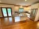 Bright, updated kitchen boasts stainless appliances, granite counters, and opens to the screened porch at 12307 Pebblepointe Pass, Carmel, IN 46033