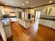 Large kitchen boasts granite countertops, stainless steel appliances, and a central island at 12307 Pebblepointe Pass, Carmel, IN 46033