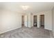 Spacious bedroom with plush carpet, neutral walls, and natural light at 15405 Fawn Meadow Dr, Noblesville, IN 46060