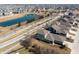 Scenic aerial view capturing homes near a winding street and picturesque lake at 1591 W 151St St, Westfield, IN 46074