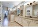 Bright bathroom featuring double vanities with granite countertops and tiled walk-in shower at 1591 W 151St St, Westfield, IN 46074