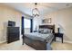 Cozy bedroom featuring neutral walls, dark wood furniture, and complementary blue accents at 1591 W 151St St, Westfield, IN 46074