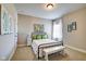 Bright bedroom with a wrought iron bed frame, and colorful accents that create a cheerful atmosphere at 1591 W 151St St, Westfield, IN 46074