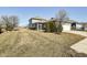 Exterior of the house featuring a screened porch and attached garage, surrounded by a well-maintained lawn at 1591 W 151St St, Westfield, IN 46074