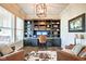 Home office with custom built-ins, hardwood floors, large windows and lots of natural light at 1591 W 151St St, Westfield, IN 46074