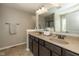 Bathroom featuring double sink vanity with granite countertop and framed mirror at 1773 Winchester Blvd, Avon, IN 46123
