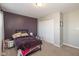 This bedroom offers a serene retreat with carpeted floors, a cozy bed, and a spacious closet at 1773 Winchester Blvd, Avon, IN 46123
