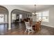 Open living room featuring a dining area and views of a front entrance at 1773 Winchester Blvd, Avon, IN 46123
