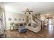 Comfortable living room with hardwood floors, stylish decor, and staircase access at 1773 Winchester Blvd, Avon, IN 46123
