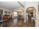 Spacious living room featuring a dining area and open floor plan, hardwood flooring, and recessed lighting at 1773 Winchester Blvd, Avon, IN 46123