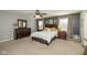 Spacious bedroom featuring a comfortable bed, neutral tones, and ample closet space at 1773 Winchester Blvd, Avon, IN 46123