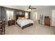 Comfortable primary bedroom with neutral tones, ceiling fan, and ample natural light at 1773 Winchester Blvd, Avon, IN 46123