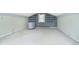 The carpeted bonus room features a high, vaulted ceiling and a charming window, offering a flexible living space at 2349 S Randolph St, Indianapolis, IN 46203