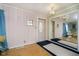 Inviting entryway with a mirrored wall, and light fixture at 2349 S Randolph St, Indianapolis, IN 46203