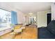 Cozy living room featuring ample seating, and large windows for natural light at 2349 S Randolph St, Indianapolis, IN 46203