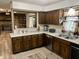 Spacious kitchen with ample counter space, stainless steel appliances, and charming decor touches at 2408 E Stafford Pl, Martinsville, IN 46151