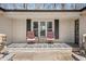 Inviting front porch with seating, perfect for relaxing outdoors with a view at 2408 E Stafford Pl, Martinsville, IN 46151
