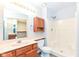 Bathroom featuring a walk-in shower, vanity with cabinet, and mirrored medicine cabinet at 245 Suncrest Dr, Greenwood, IN 46143
