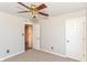 Neutral bedroom with a ceiling fan and carpet at 245 Suncrest Dr, Greenwood, IN 46143