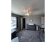 Cozy bedroom with a ceiling fan, a dresser with changing pad, and a neutral color scheme at 298 Rocky Rd, Greenfield, IN 46140
