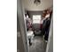 Walk-in closet featuring carpet flooring, natural light, and well-organized storage with ample hanging space at 298 Rocky Rd, Greenfield, IN 46140