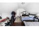 Upstairs bedroom features hardwood floors, natural lighting, and a workspace at 3432 Shepperton Blvd, Indianapolis, IN 46228