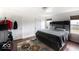 Spacious bedroom features neutral tones, natural lighting, and hardwood floors at 3432 Shepperton Blvd, Indianapolis, IN 46228
