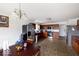 Well-lit kitchen featuring stainless steel appliances and a dining area at 3432 Shepperton Blvd, Indianapolis, IN 46228