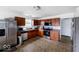 Efficient kitchen layout with stainless steel appliances and ample cabinet storage at 3432 Shepperton Blvd, Indianapolis, IN 46228