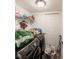 Cozy laundry area with modern appliances, shelf and folding door at 3432 Shepperton Blvd, Indianapolis, IN 46228
