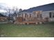 Backyard featuring a wooden patio and large lawn at 37 Trotters Run, Brownsburg, IN 46112