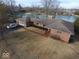 Stunning brick home on a waterfront lot with a large garage, providing picturesque lakeside living at 3752 W North Wood Lake Dr, Columbus, IN 47201
