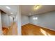 Finished basement space with hardwood floors, a window, and neutral paint at 3752 W North Wood Lake Dr, Columbus, IN 47201