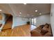 Spacious finished basement with ample lighting and a walkout to the yard at 3752 W North Wood Lake Dr, Columbus, IN 47201