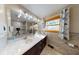 Elegant bathroom with a double sink vanity, marble countertops, and a large mirror at 3752 W North Wood Lake Dr, Columbus, IN 47201