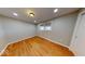 Bright bedroom with hardwood floors, fresh paint, and natural light at 3752 W North Wood Lake Dr, Columbus, IN 47201