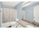 Modern bathroom with granite countertop vanity, and a shower-tub combination at 451 Filmore Dr, Westfield, IN 46074