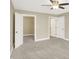 Large bedroom with carpet, a ceiling fan, and access to the closet and bathroom at 451 Filmore Dr, Westfield, IN 46074
