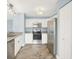 Well-equipped kitchen featuring stainless steel appliances and granite countertops at 451 Filmore Dr, Westfield, IN 46074