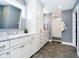 Bathroom features double sink vanity and glass shower at 5032 N Illinois St, Indianapolis, IN 46208
