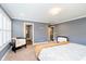 Bedroom features natural light and accent chairs at 5032 N Illinois St, Indianapolis, IN 46208