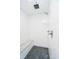 Bathroom shower with herringbone tile and bench seat at 5032 N Illinois St, Indianapolis, IN 46208