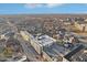 Wide aerial shot of modern apartment buildings surrounded by cityscape and traditional neighborhood architecture at 546 E Merrill St, Indianapolis, IN 46203